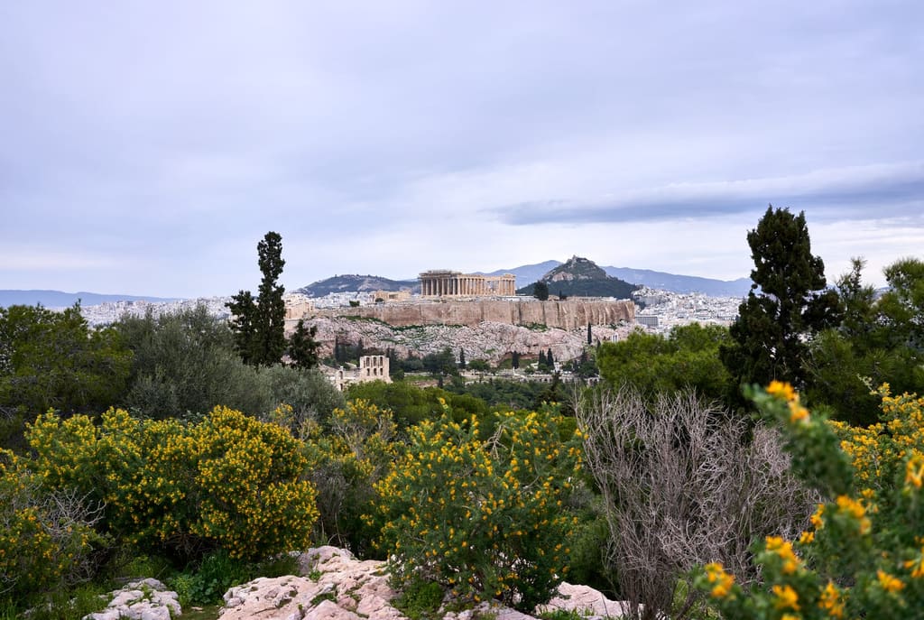 The Acropolis and Mount Lycabettus above the Athens skyline, seen from Philopappos Hill