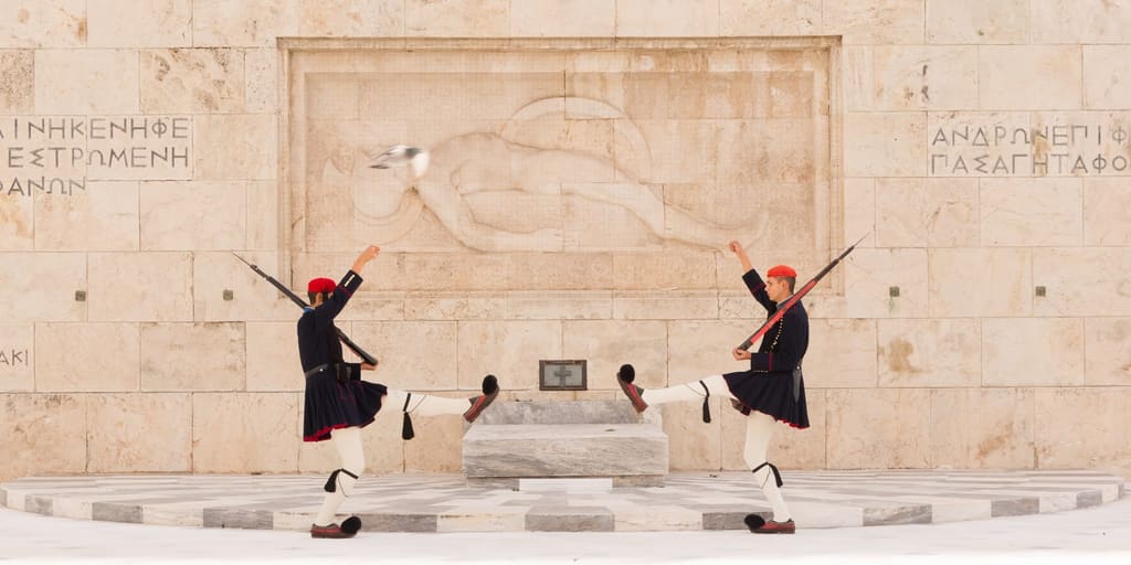 Evzones, the ceremonial guard, at the Tomb of the Unknown Soldier by Parliament on Syntagma Square, Athens